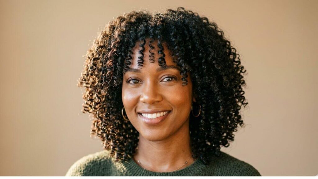 curly coily shoulder length hairstyle for women