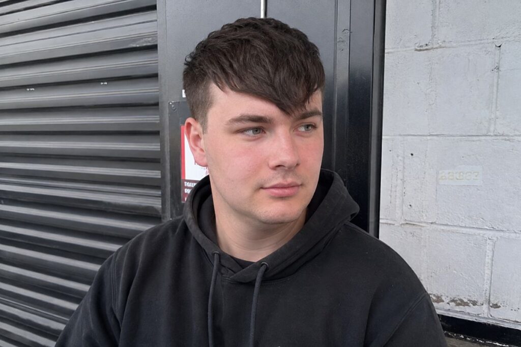 Angular fringe hairstyle for round face shape men