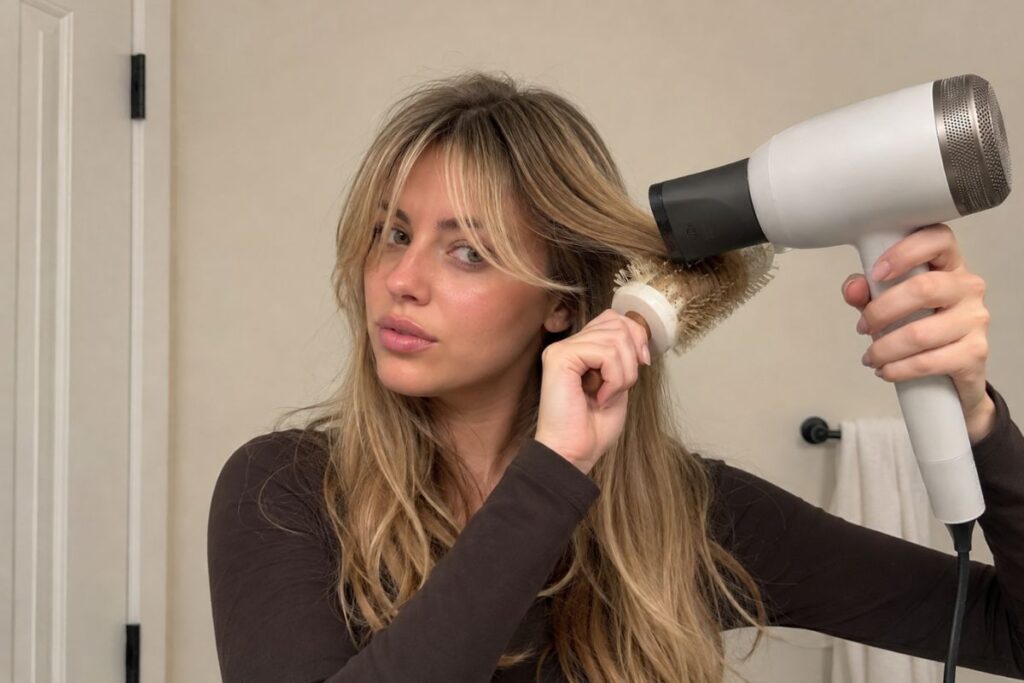 Blow drying curtain bangs with a round brush