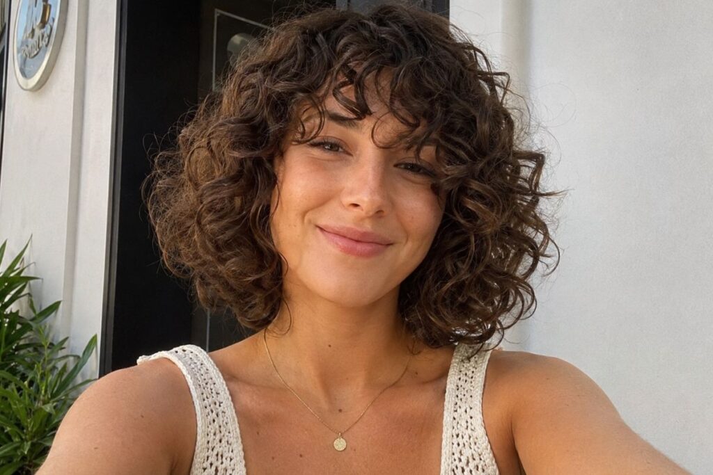 Curly bob hairstyle for heart face shape