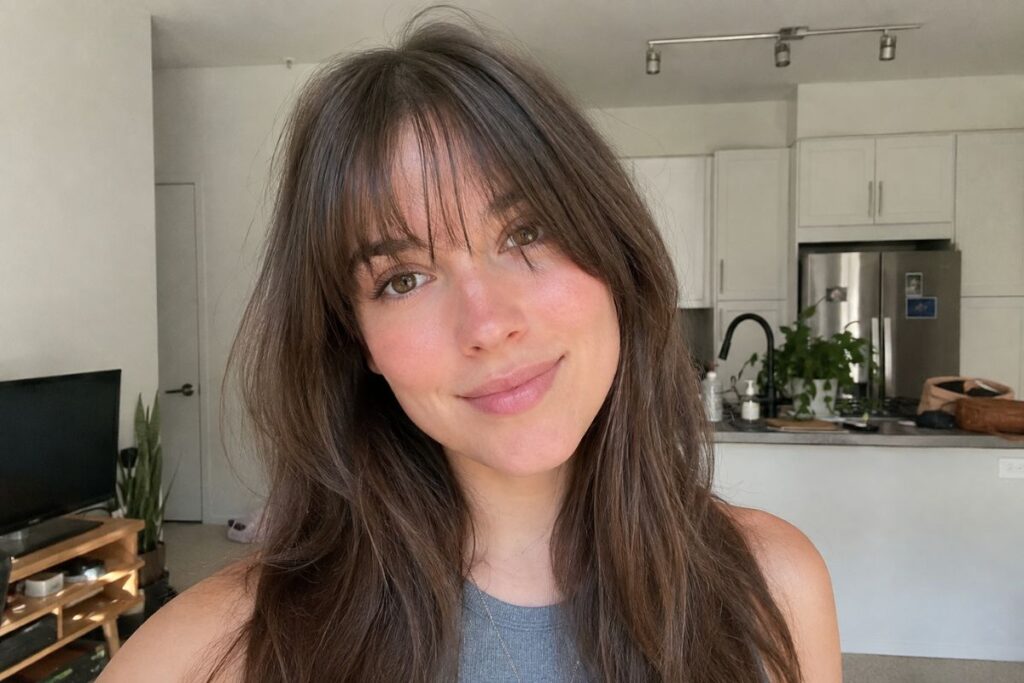Feathery fringe hairstyle for heart face shape