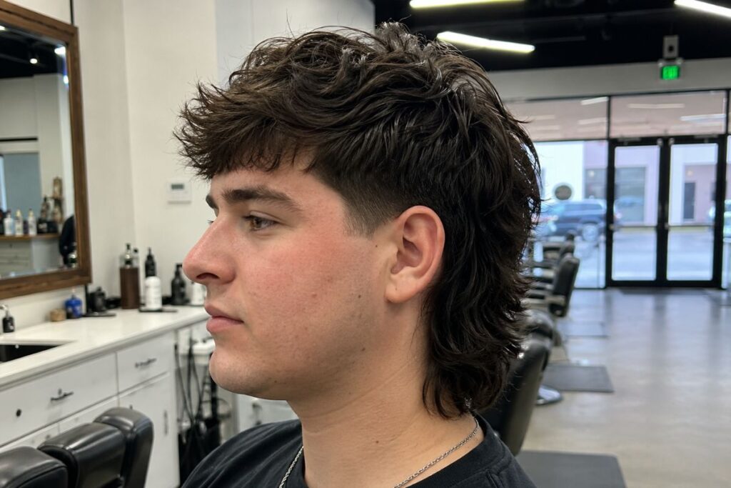 Modern mullet hairstyle for round face shape men