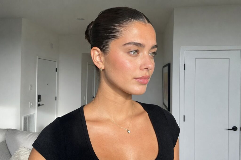 Slicked back bun for heart face shape