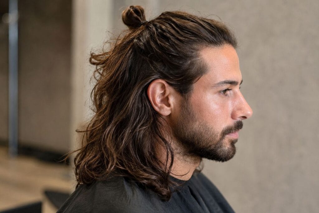 Half up half down hairstyle for men